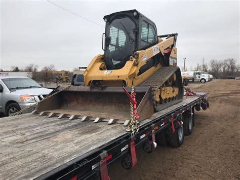 chain skid steer to trailer